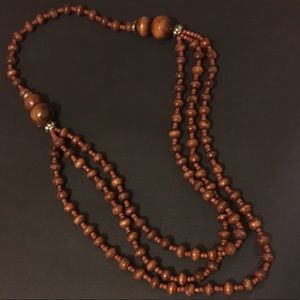 Brown wood necklace.